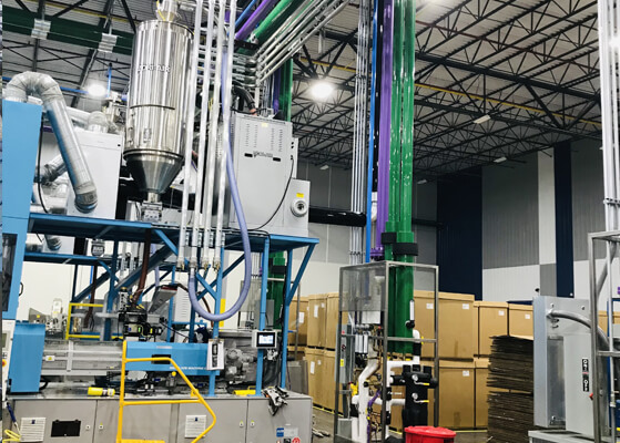 Interior view of production equipment at a global plastics manufacturer